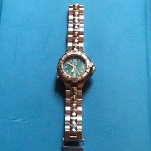 Guess woman’s wristwatch stainless silver waterpro